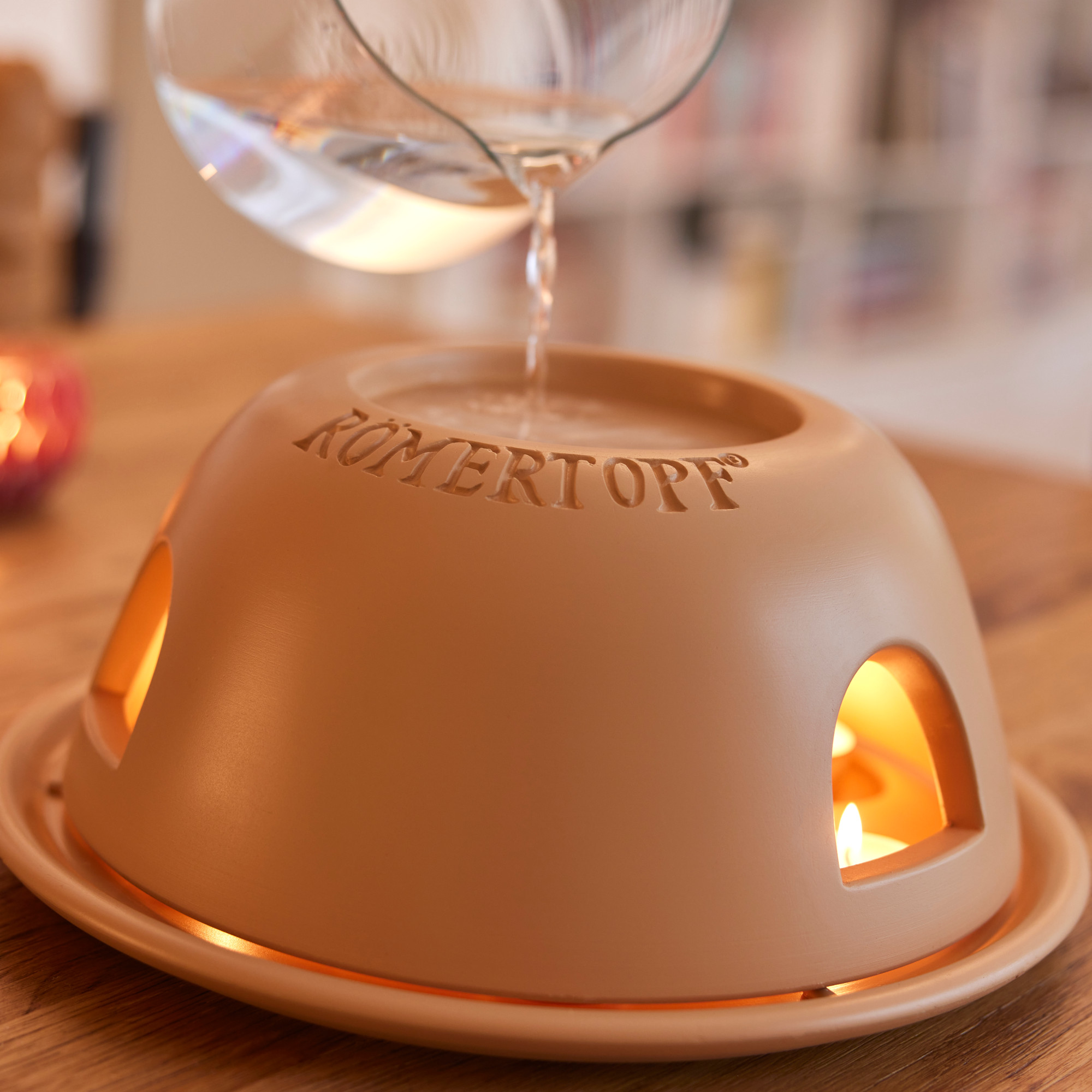 Römertopf Teelichtofen-der-heiße-Heinz Wasser